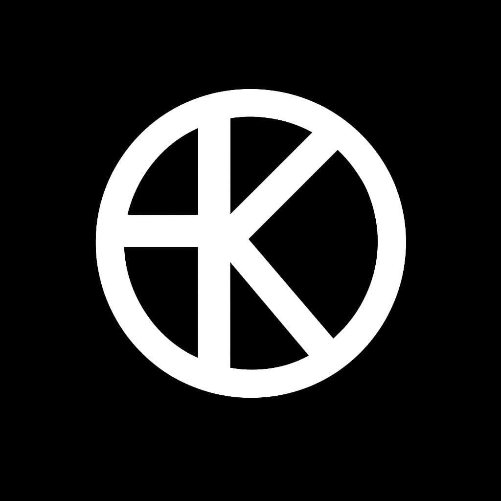 Kellani monogram logo: a white letter K inside a circle on a black background